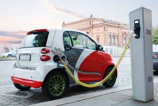 Electro car is charging on the street Elektromobilität