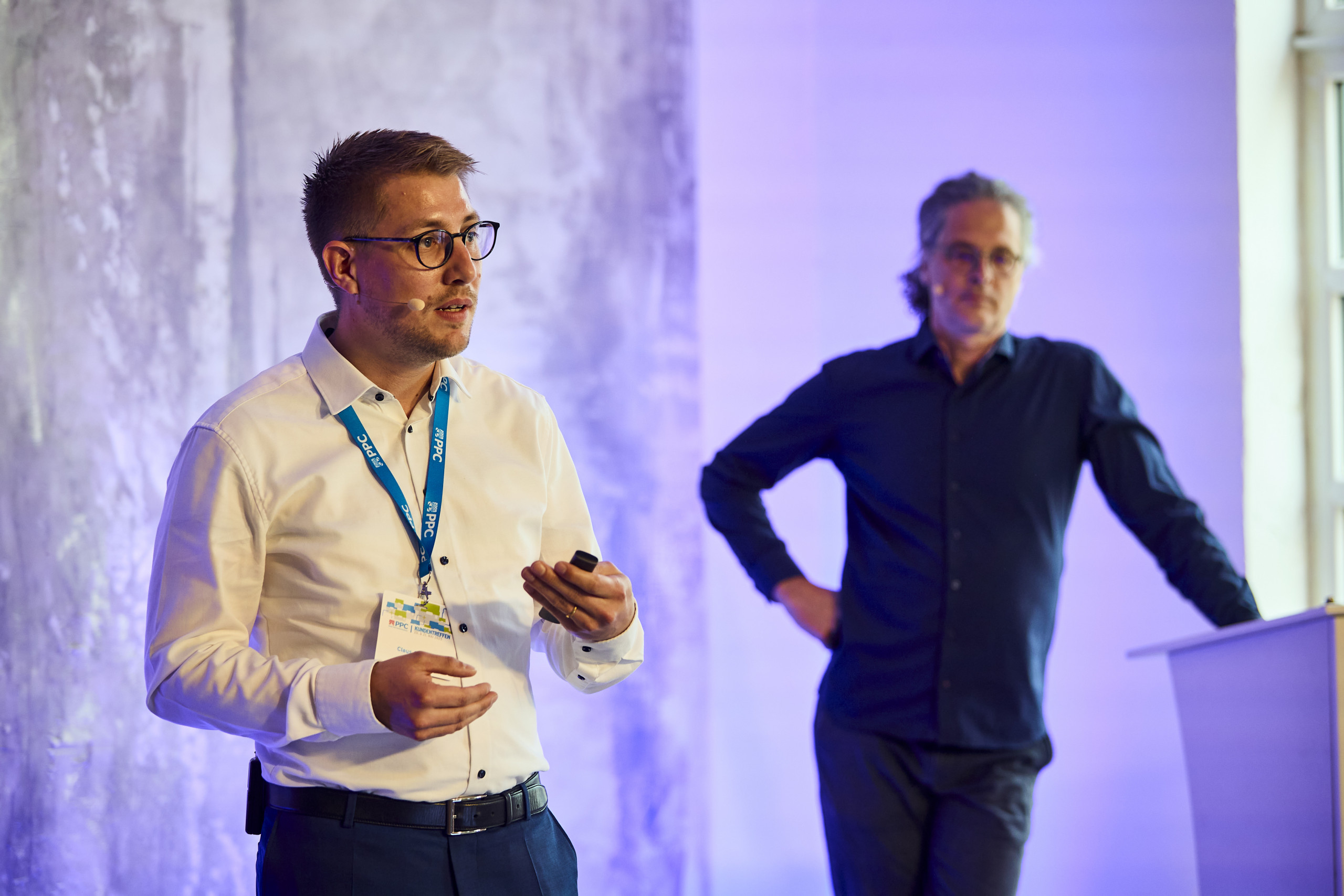 Claus Conrads und Bernhard Böhmer auf der Bühne des PPC Kundentreffens